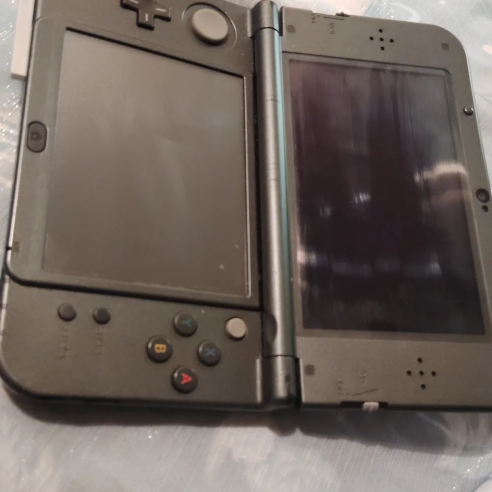 Nintendo DS with Red and Black Case